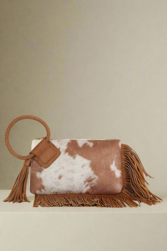 COW PRINT WRISTLET CLUTCH