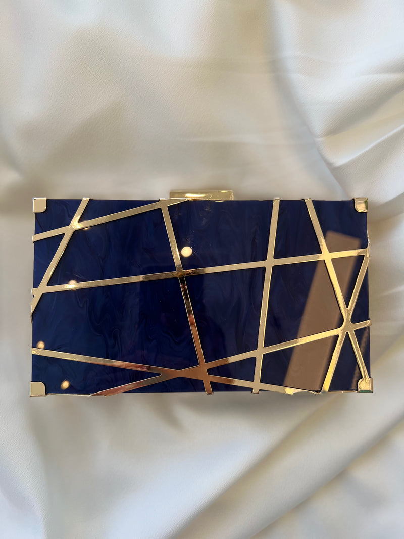 GOLD LAZER CUT MARBLE CLUTCH
