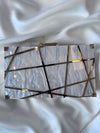 GOLD LAZER CUT MARBLE CLUTCH