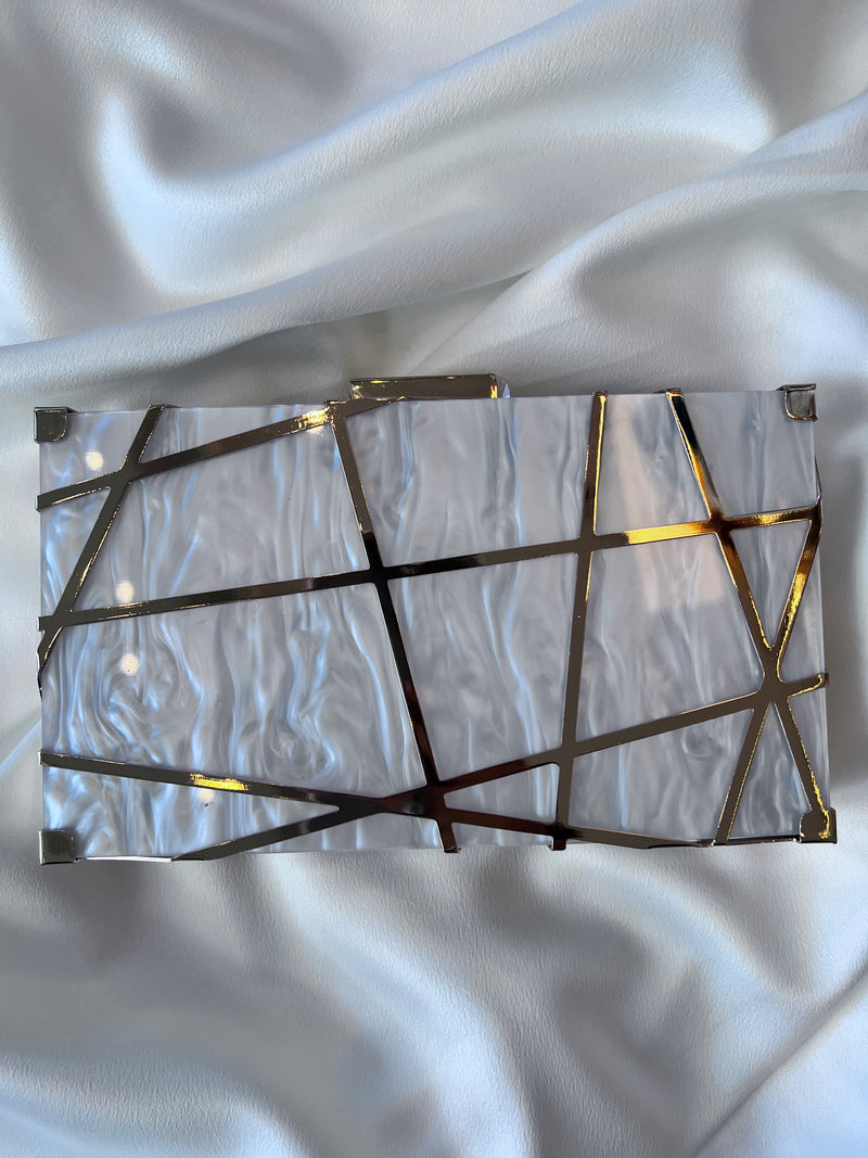 GOLD LAZER CUT MARBLE CLUTCH